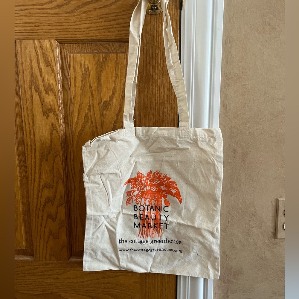 The Cottage Greenhouse Cream Tote Bag with Orange Print